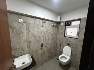 Bathroom in 2 BHK Apartment at Vaastu Omkar, Vile Parle East – for Rent