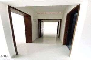 Building Lobby in 1 BHK Apartment at Wadgaon Sheri – for Rent