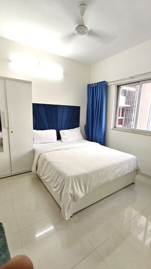Bedroom in 1 BHK Apartment at Omkar Signet, Malad East – for Rent
