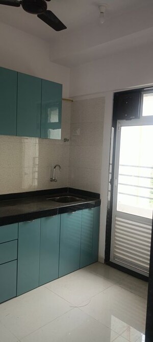 Kitchen in 1 BHK Apartment at Asmi Shimmers, Goregaon East – for Rent