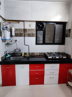 Kitchen in 2 BHK Apartment at Omkar Vanashree, Hadapsar – for Rent