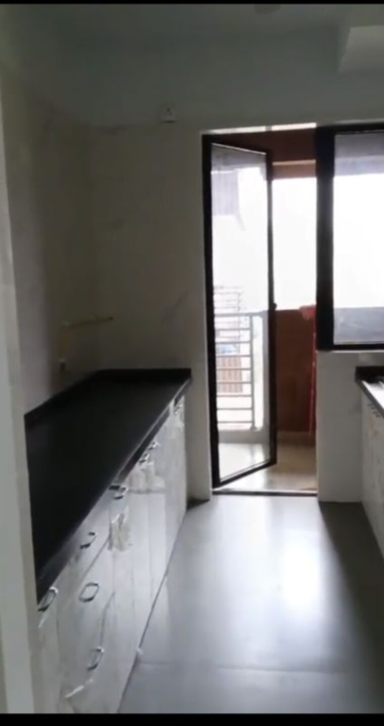 Kitchen, risland-the-icon-phase-2 2 Bedroom 561 Sq.Ft. Apartment In Dhokali Thane 10665546