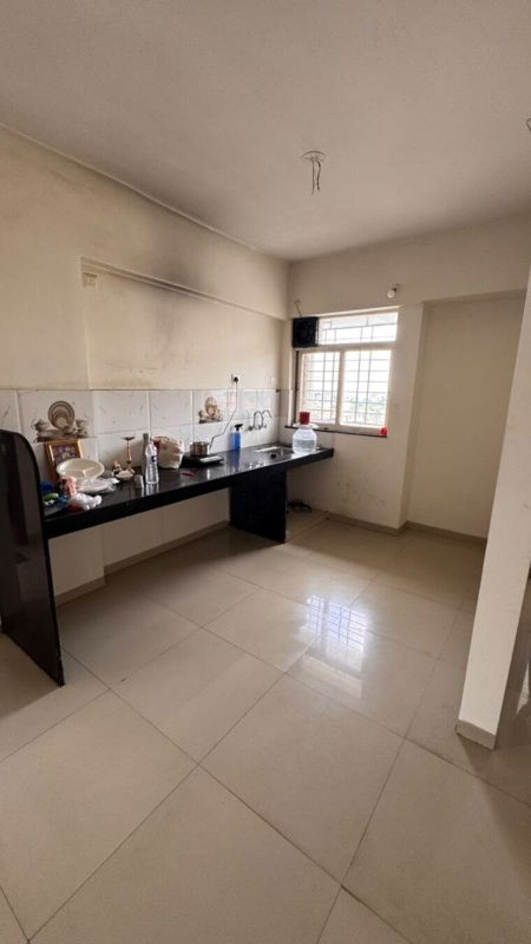 Kitchen, supertech-defence-colony-phase-l 2 Bedroom 900 Sq.Ft. Apartment In Wagholi Pune 10665580