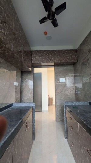 Kitchen in 2 BHK Apartment at DGS Sheetal Ekta, Malad East – for Rent