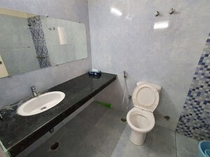 Bathroom in 3 BHK Apartment at Ansal Sushant Jeevan Enclave, Sushant Golf City – for Rent