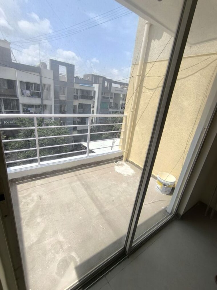 Balcony, nivasa-prakriti 1 Bedroom 560 Sq.Ft. Apartment In Lohgaon Pune 10665681
