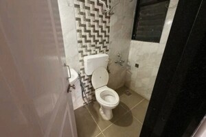 Bathroom in 2 BHK Apartment at Hubtown Greenwoods, Vartak Nagar – for Rent