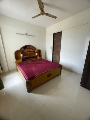 Bedroom in 2 BHK Apartment at Ravinanda Skylights, Wagholi – for Rent
