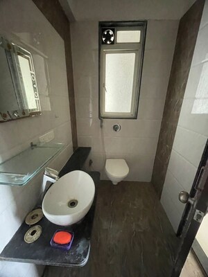 Bathroom in 2 BHK Apartment at Ravinanda Skylights, Wagholi – for Rent
