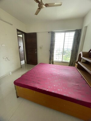 Bedroom in 2 BHK Apartment at Ravinanda Skylights, Wagholi – for Rent