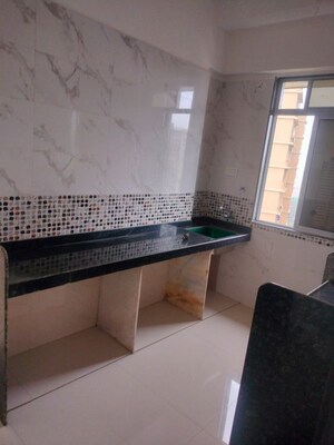 Kitchen in 3 BHK Apartment at DGS Sheetal Tapovan, Malad East – for Rent