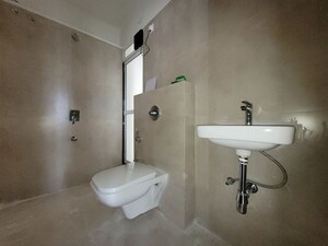 Bathroom in 1 BHK Apartment at Puranik City Reserva, Ghodbunder Road – for Rent