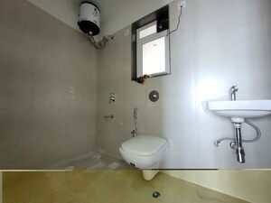 Bathroom in 1 BHK Apartment at Puranik City Reserva, Ghodbunder Road – for Rent