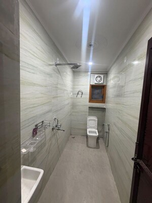 Bathroom in 1 BHK Apartment at Palm Residency Chhatarpur, Chattarpur – for Rent