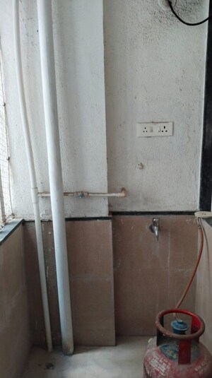 Bathroom in 2 BHK Apartment at Ravinanda Skylights, Wagholi – for Rent