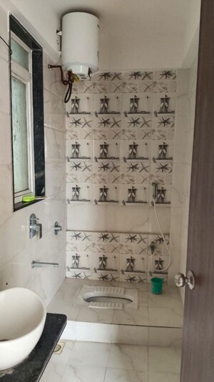 Bathroom in 2 BHK Apartment at Ravinanda Skylights, Wagholi – for Rent