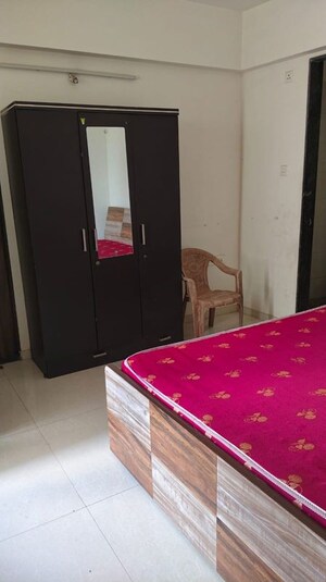 Bedroom in 2 BHK Apartment at Ravinanda Skylights, Wagholi – for Rent