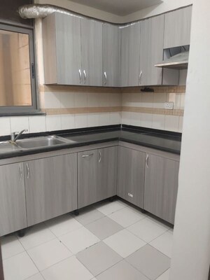 Kitchen in 3 BHK Apartment at Unitech Uniworld Gardens 2, Sector 47 – for Rent