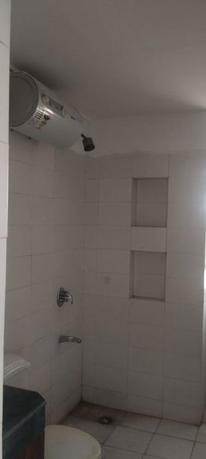Bathroom in 3 BHK Apartment at Puri Pranayam, Sector 82 – for Rent