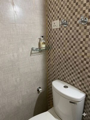 Bathroom in 2 BHK Apartment at Shri Radha Sky Gardens, Sector 16b Greater Noida – for Rent