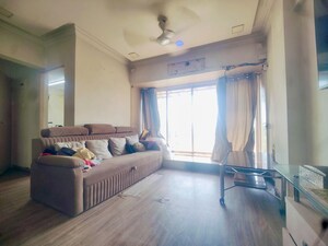 Living Room in 1 BHK Apartment at HDIL Dheeraj Jamuna, Malad West – for Rent