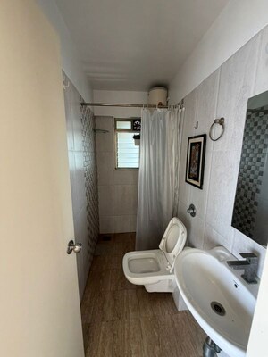 Bathroom in 3 BHK Apartment at Cosmopolis Tower, Andheri West – for Rent
