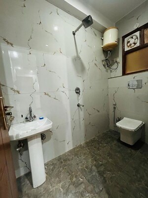 Bathroom in 2 BHK Apartment at Palm Residency Chhatarpur, Chattarpur – for Rent