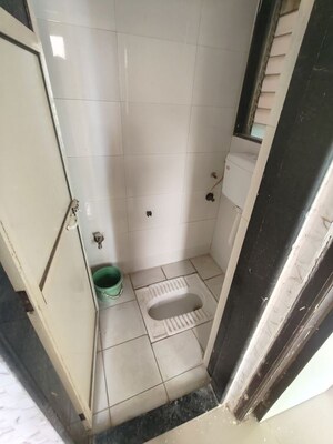 Bathroom in 1 BHK Apartment at Shri Kambeshwar Heights, Morya Nagar – for Rent