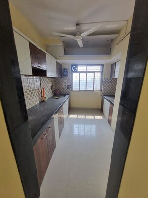 Kitchen in 2 BHK Apartment at Jambli Naka – for Sale