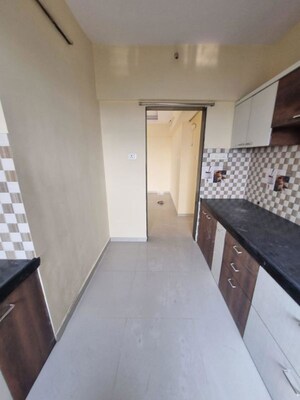 Kitchen in 2 BHK Apartment at Jambli Naka – for Sale