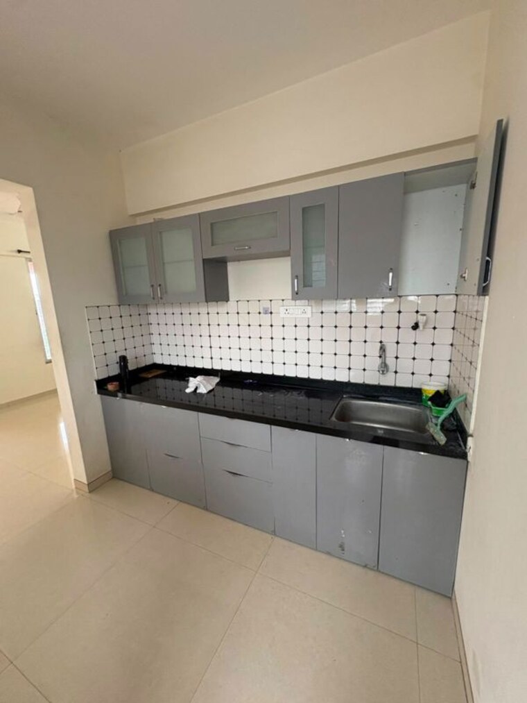 Kitchen, vision-starwest-phase-1 2 Bedroom 1100 Sq.Ft. Apartment In Tathawade Pune 10666269