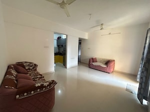 Living Room in 2 BHK Apartment at Kohinoor Zen Estate, Kharadi – for Rent