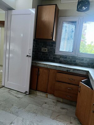 Kitchen in 3.5 BHK Apartment at Hope Apartments, Sector 15 – for Rent