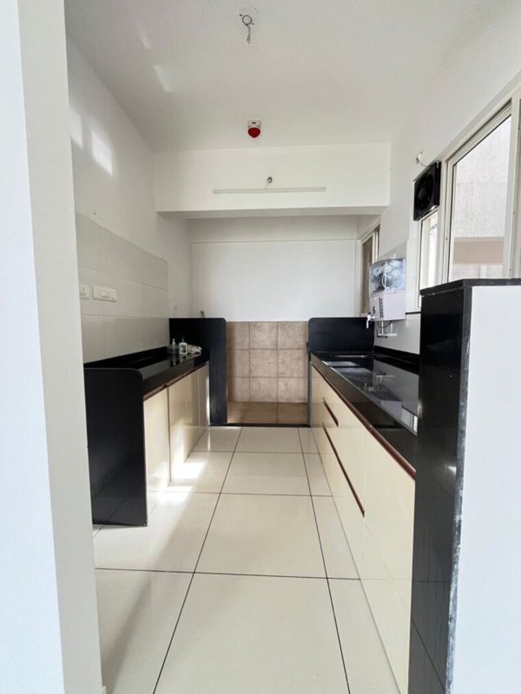 Kitchen, vj-yashone-infinitee 2 Bedroom 707 Sq.Ft. Apartment In Tathawade Pune 10666446