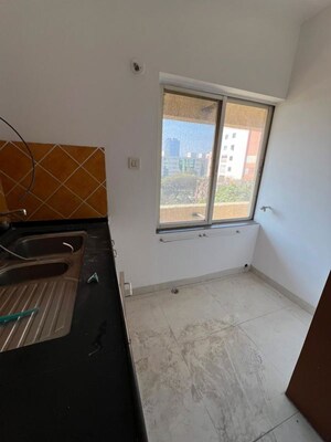 Kitchen in 4 BHK Apartment at Landmark Garden, Kalyani Nagar – for Rent