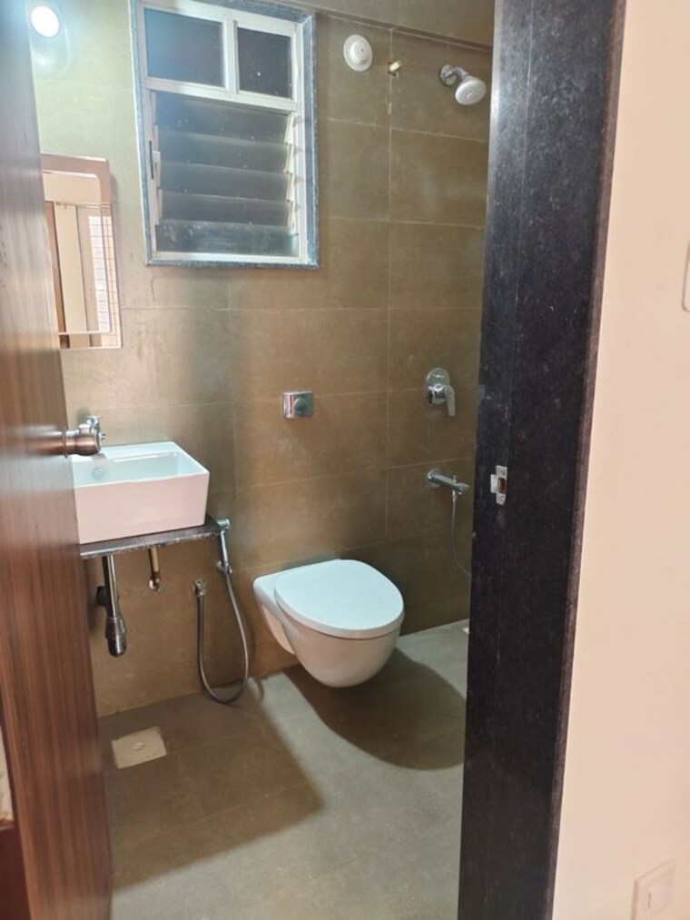 Bathroom, mantra-99-riverfront 2 Bedroom 1000 Sq.Ft. Apartment In Baner Pune 10498655