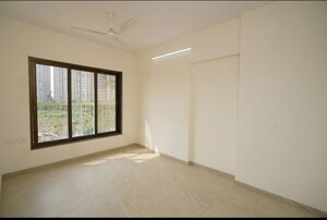 Room in 2 BHK Apartment at Abrol Signature, Malad West – for Sale