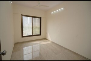 Room in 2 BHK Apartment at Abrol Signature, Malad West – for Sale