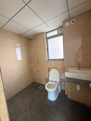 Bathroom in 2 BHK Apartment at Kalpataru Immensa, Kolshet Road – for Rent