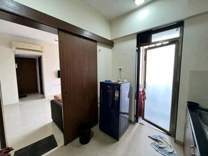 Living Room in 2 BHK Apartment at Hubtown Hillcrest, Andheri East – for Sale