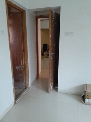 Building Lobby in 2 BHK Apartment at Romell Allure, Borivali East – for Rent