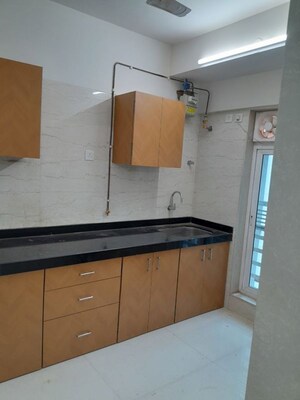 Kitchen in 2 BHK Apartment at Romell Allure, Borivali East – for Rent