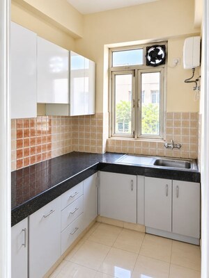 Kitchen in 2 BHK Apartment at Shree Vardhman Mantra, Sector 67 – for Rent