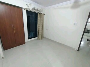 Room in 2.5 BHK Apartment at Dosti Oro 67, Kandivali West – for Sale