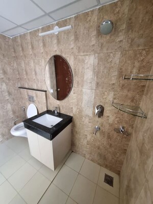 Bathroom in 2 BHK Apartment at Shapoorji Pallonji Joyville Gurgaon, Sector 102 – for Rent