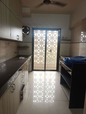 Kitchen in 2 BHK Apartment at Sangam CHS, Goregaon East – for Rent