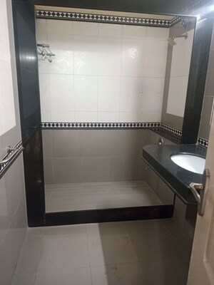 Bathroom in 2 BHK Apartment at Sangam CHS, Goregaon East – for Rent