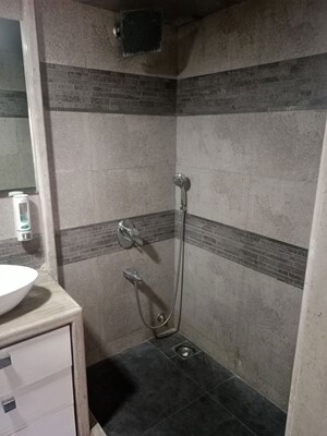 Bathroom in 2 BHK Apartment at Sangam CHS, Goregaon East – for Rent