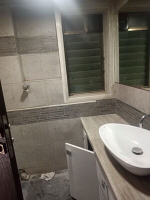 Bathroom in 2 BHK Apartment at Sangam CHS, Goregaon East – for Rent