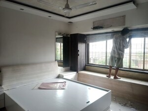 Living Room in 2 BHK Apartment at Sangam CHS, Goregaon East – for Rent